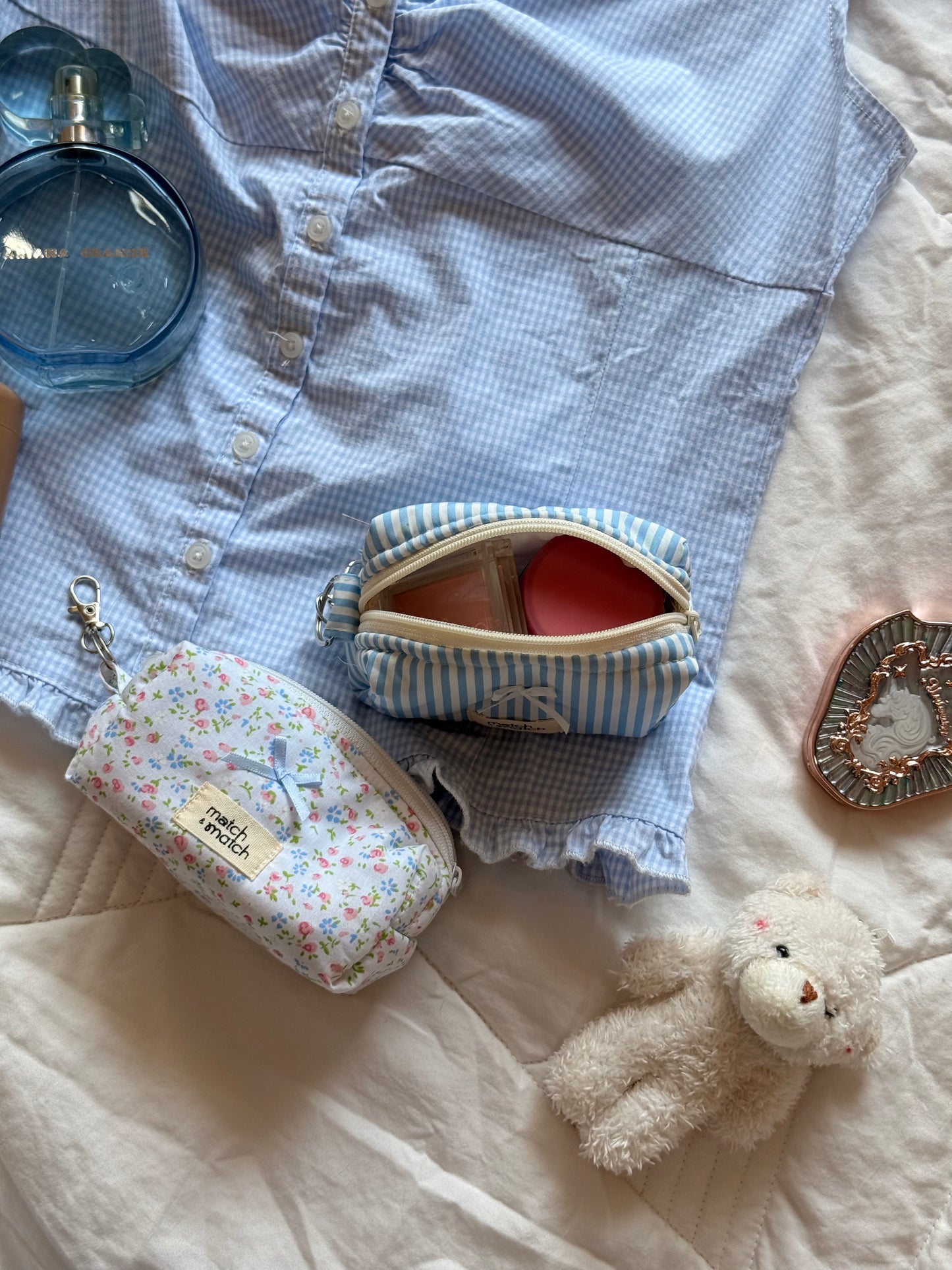  The 󠀯Petite Pouch