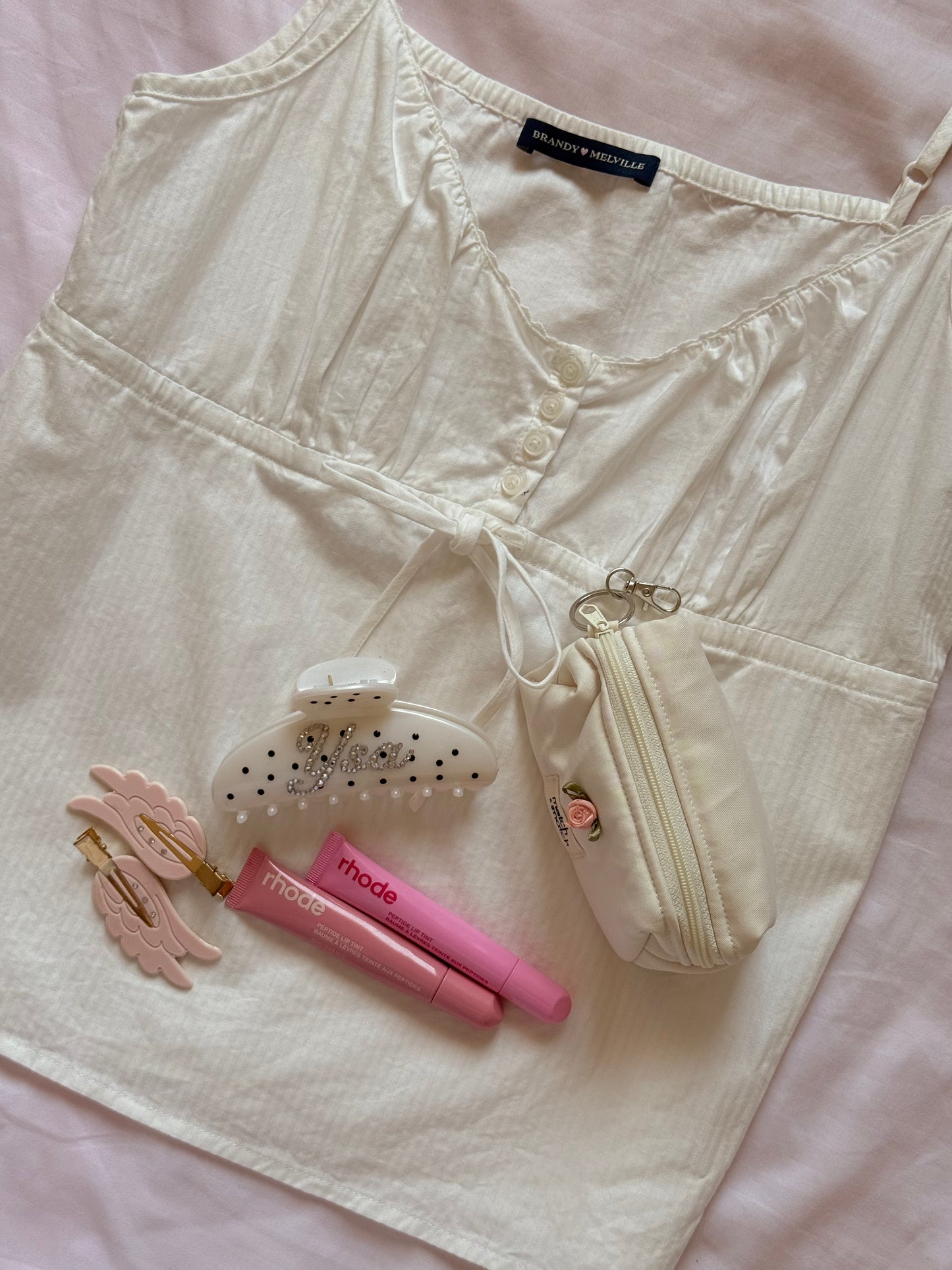  The 󠀯Petite Pouch
